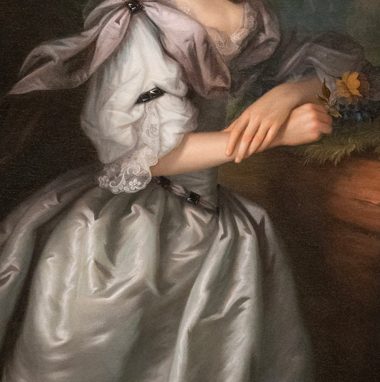 Portrait of a person in a white dress with lace details, wearing a pink headscarf.